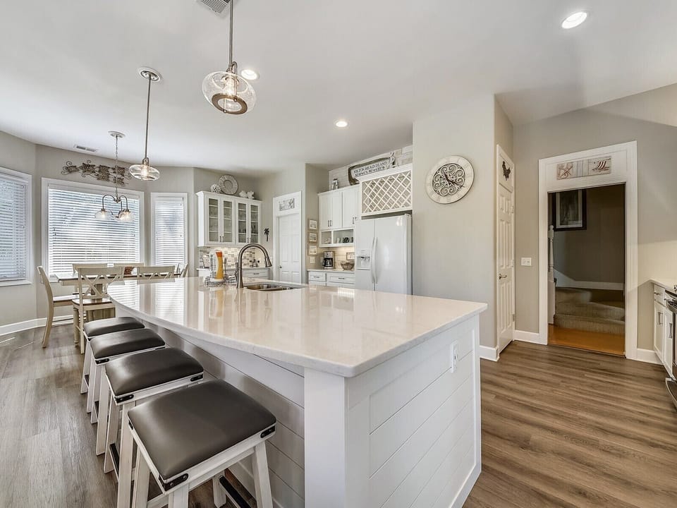 Newly designed kitchen island provides seating for four.