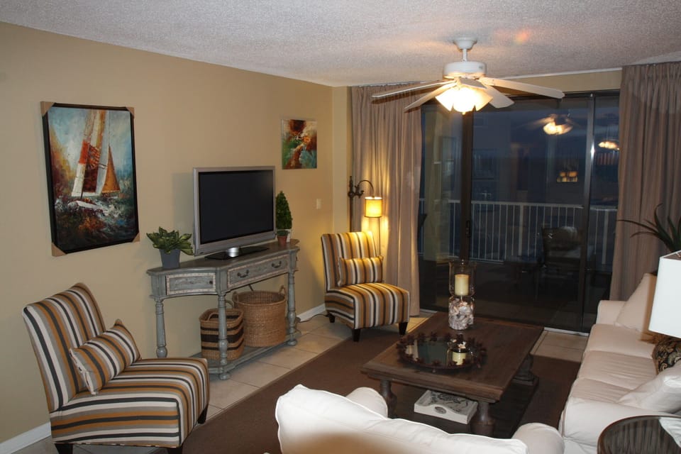 Family room.  Plasma HD television. Ample seating.