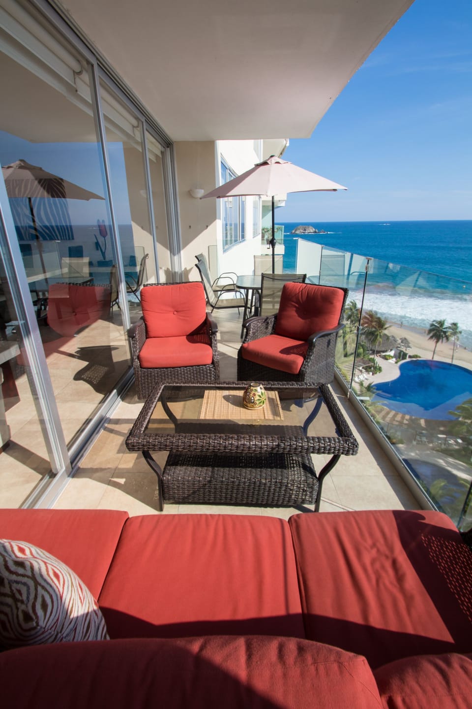 Enjoy drinks on the deck in the comfort of this sitting area.