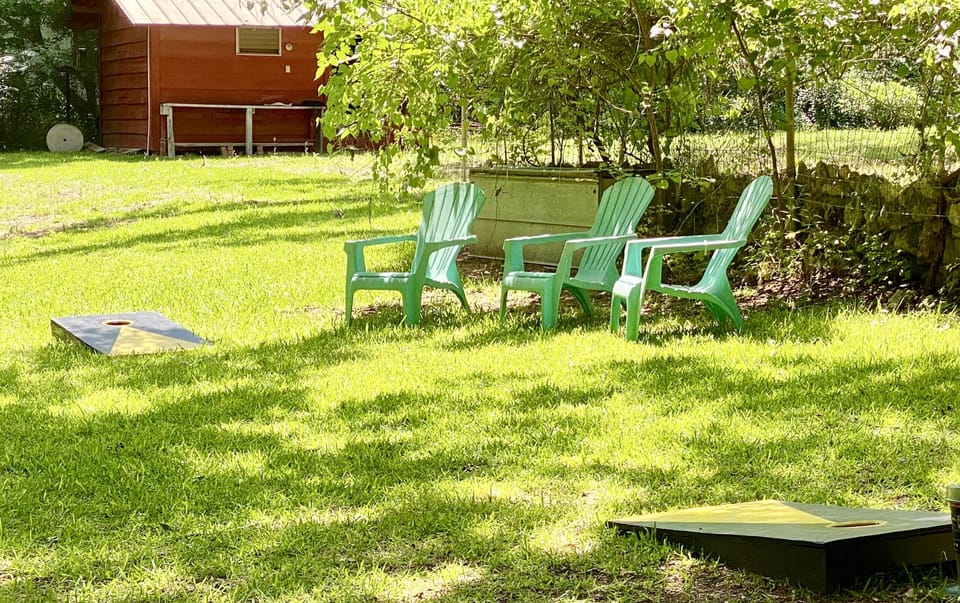 Outside fun - Cornhole, volleyball, tetherball, horseshoes, rope swing, kayaks, and more!