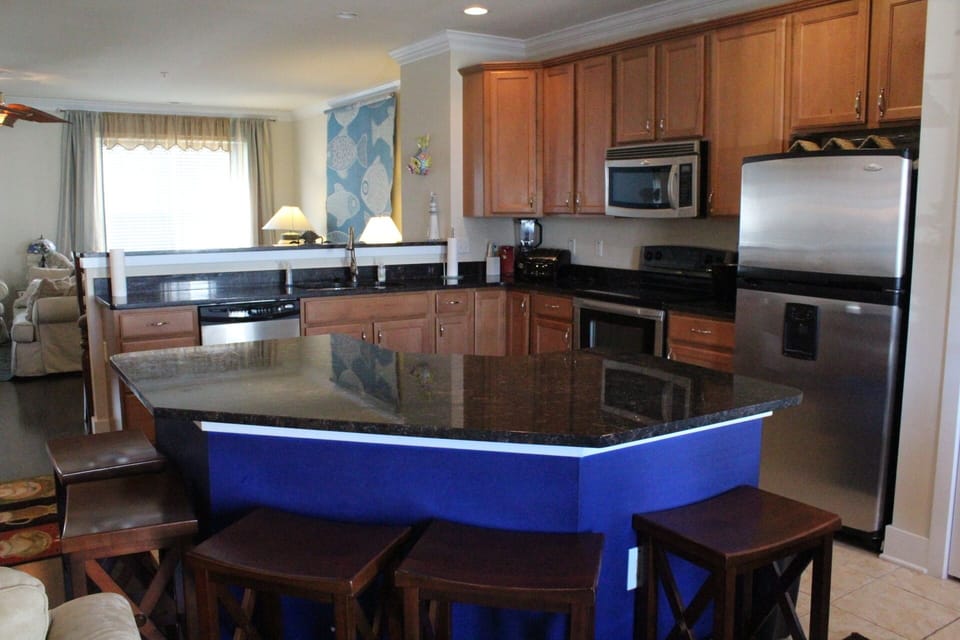 Seating Area 3 and Fully Stocked Kitchen