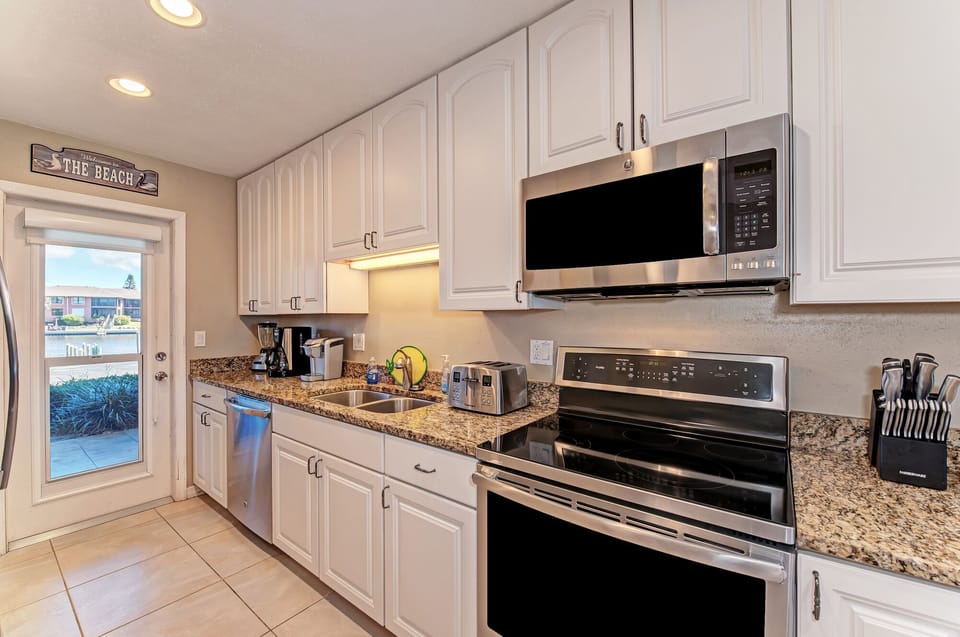 GE Profile Stainless Steel Appliances & Refrigerator with Ice and water maker