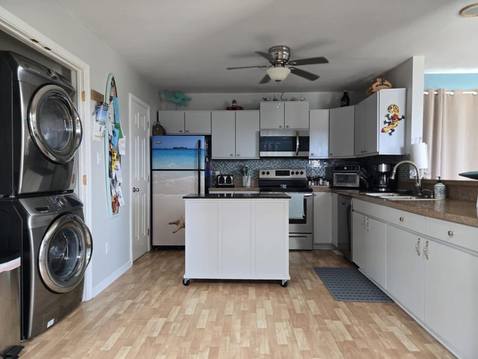 Kitchen with washer and dryer
