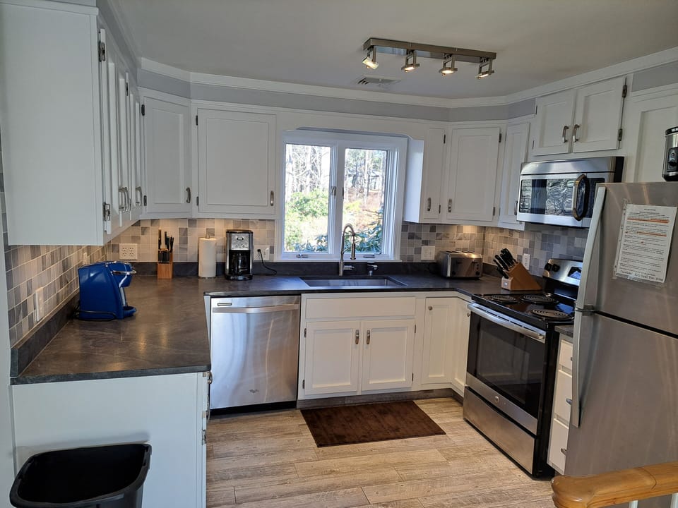 Main Floor Kitchen #1 with new quartz countertops, sink & backsplash