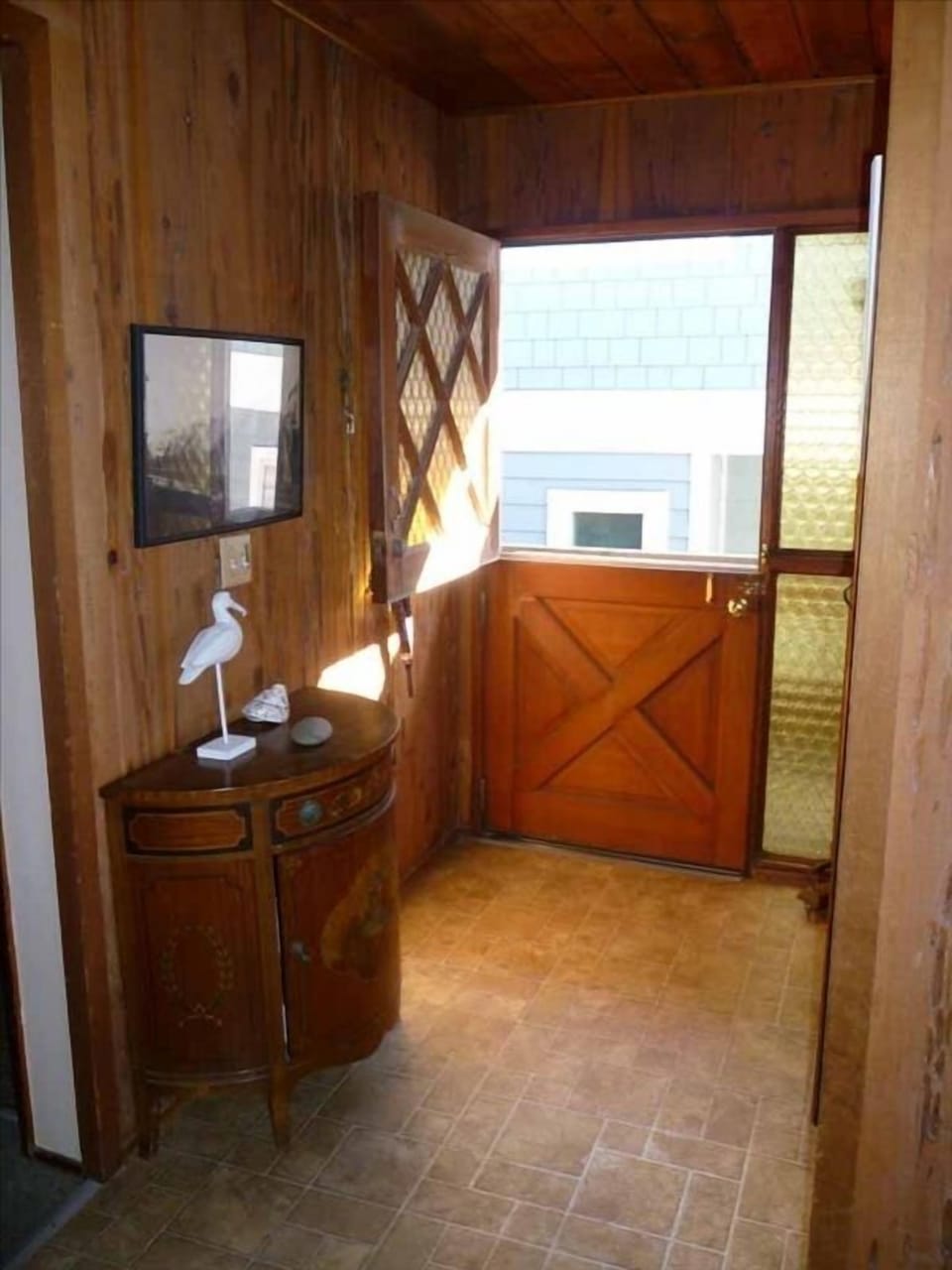 South facing entry way with dutch door to let in ocean breezes.