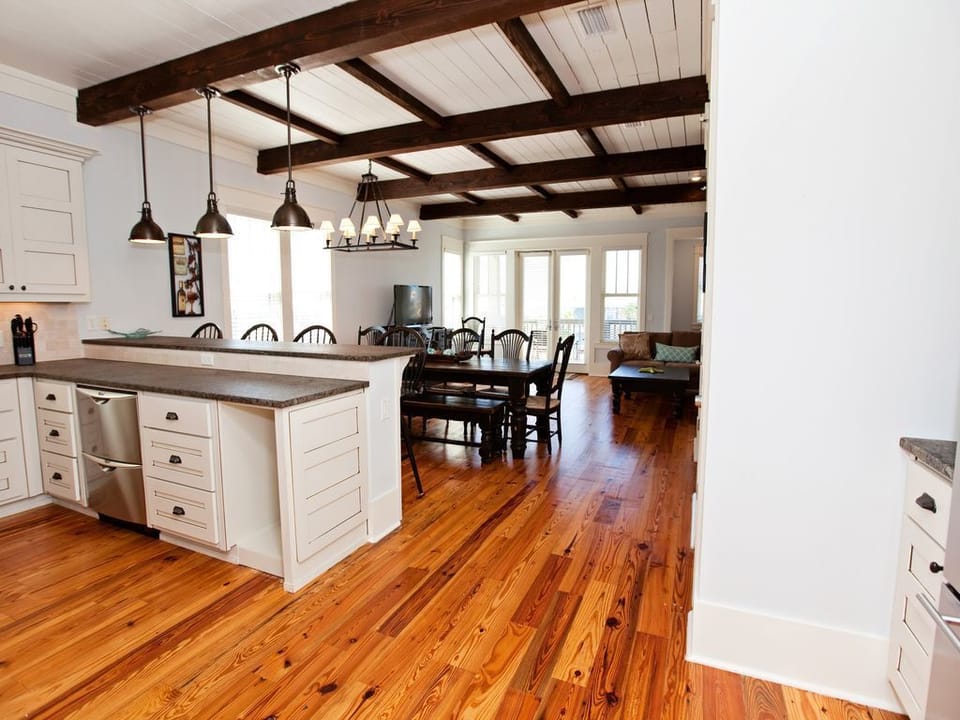 The kitchen, eating area and seating area, beautiful balcony for viewing.