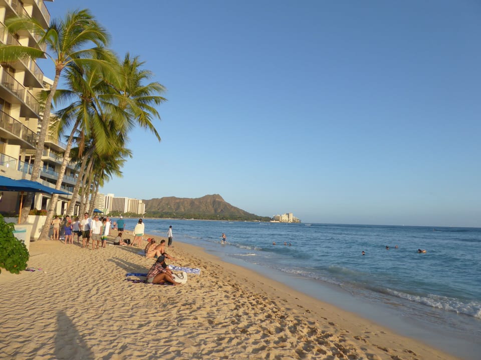 Waikiki Beach right outside the building overlooking Diamond Head