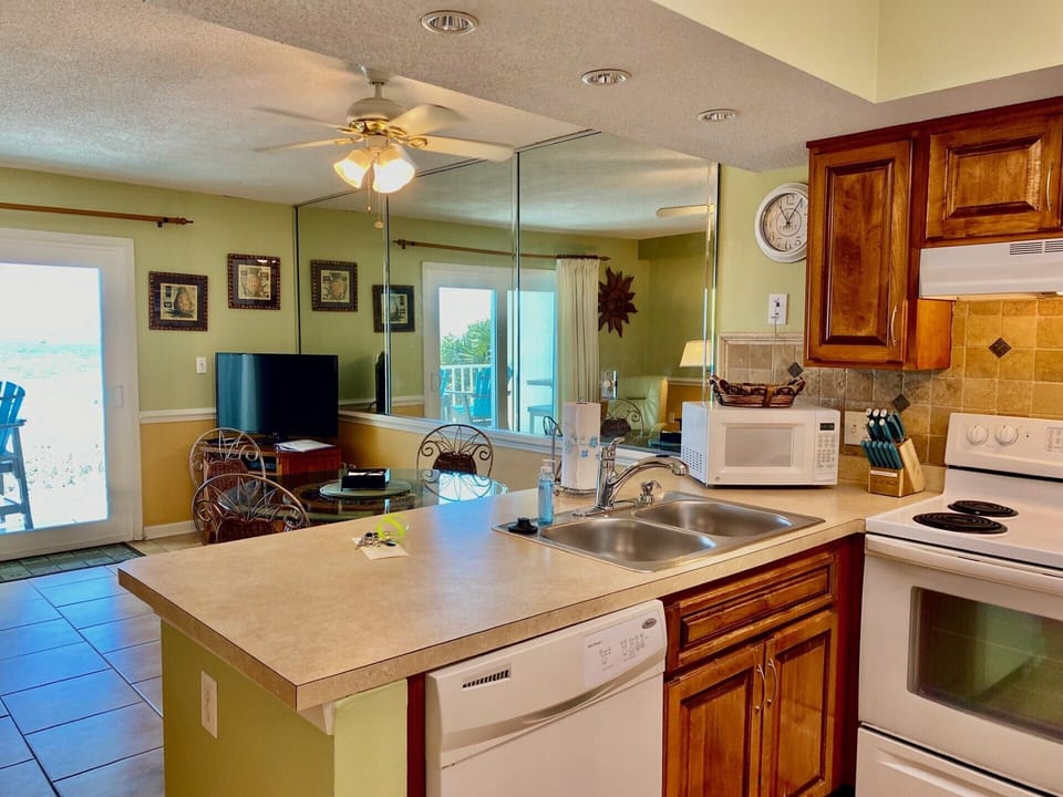 Kitchen - stove, microwave, refrigerator, dishwasher, pantry closet