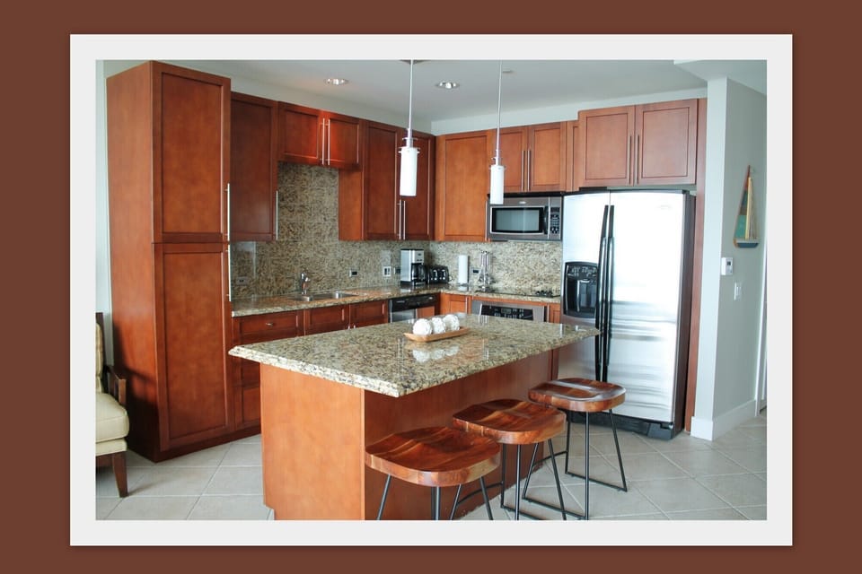 Fully equipped kitchen that is open to the living room