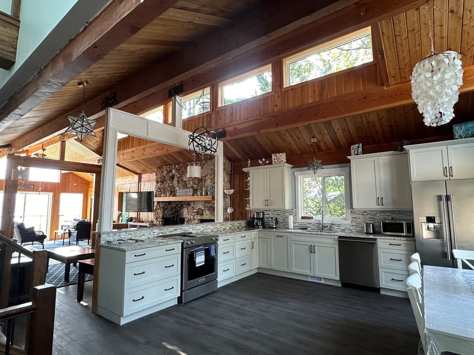 Kitchen with vaulted ceilings and plenty of natural light.