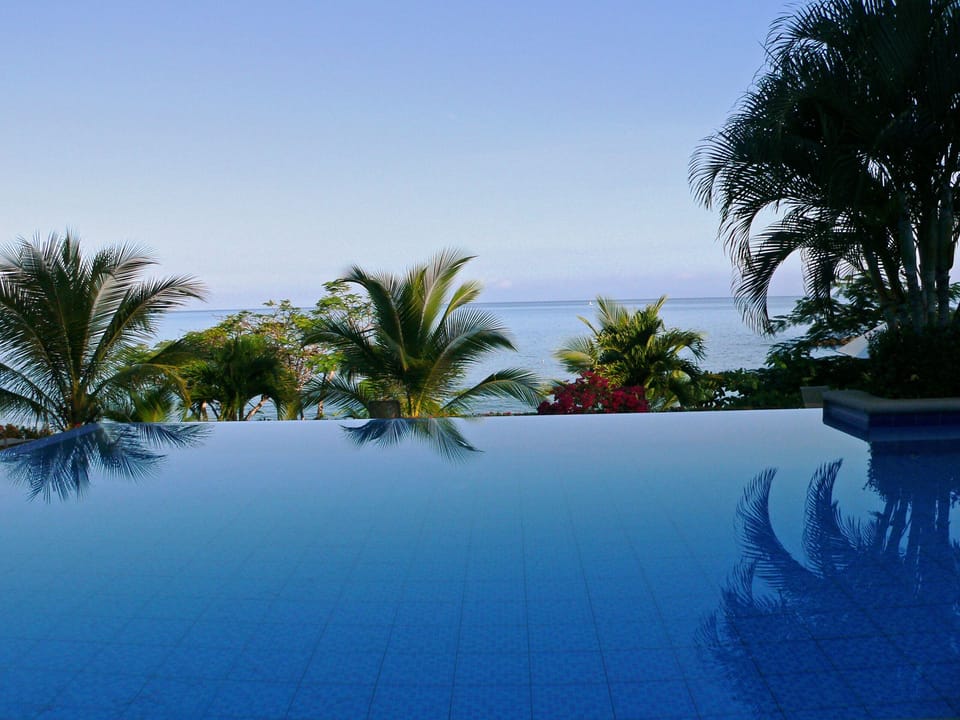 The infinity pool right next to the Flying H Villa.  A beautiful morning view.