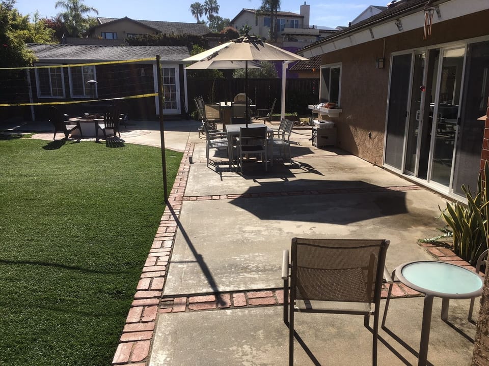 Enjoy the open outside space: badminton play, gas fire pit, gas BBQ, and dining.