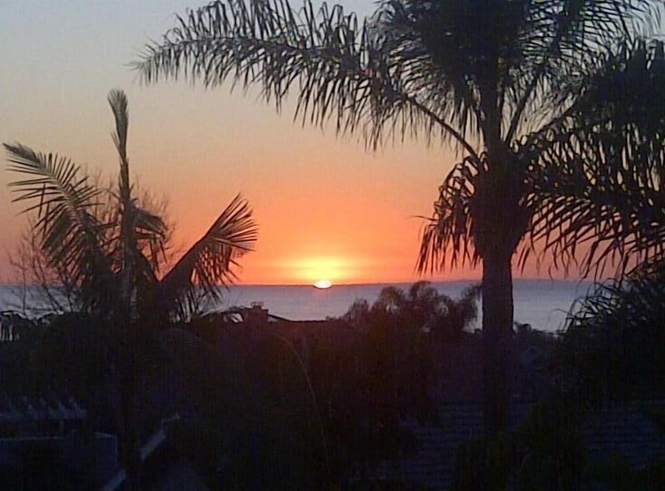 Actual Sunset view from Upper Deck.  Perfect for coffee or cocktails.