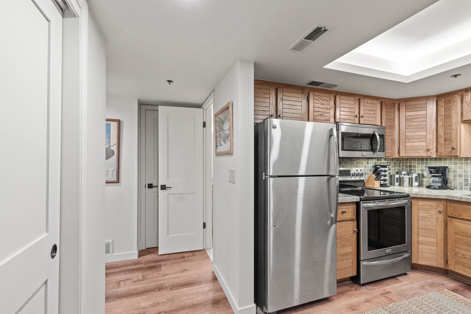 Kitchen and hallway into bedrooms /baths