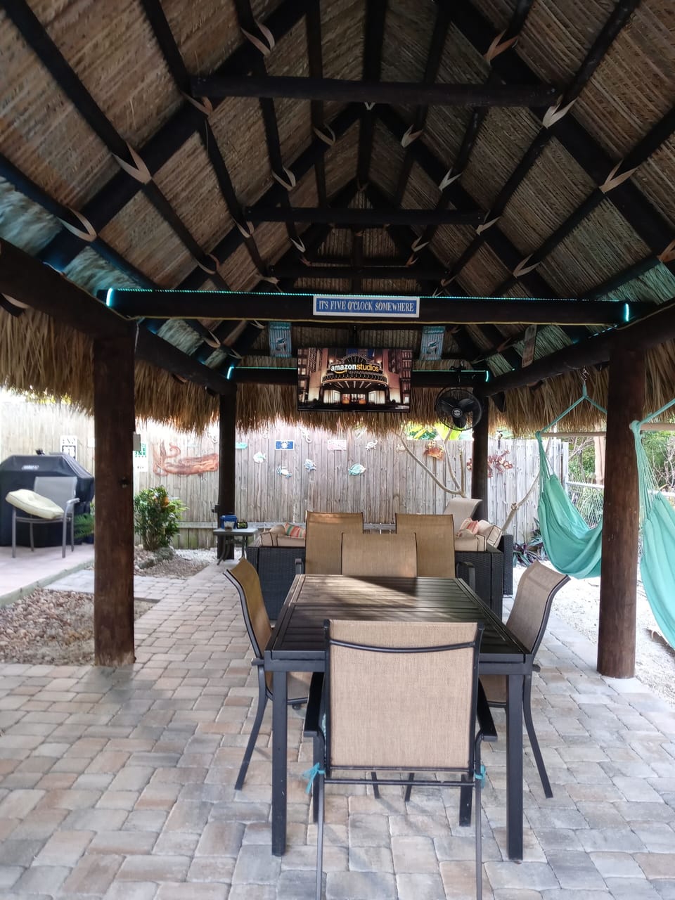 65" Smart TV, outside dinning and relaxing area