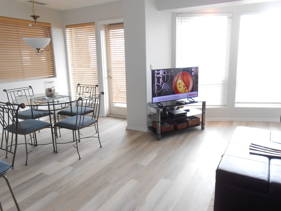 Living room, dining room, kitchen open concept - oceanfront w/balcony