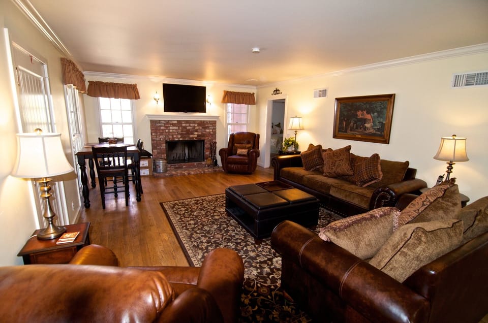 House # 1 Living room with fireplace and flat screen TV & wifi