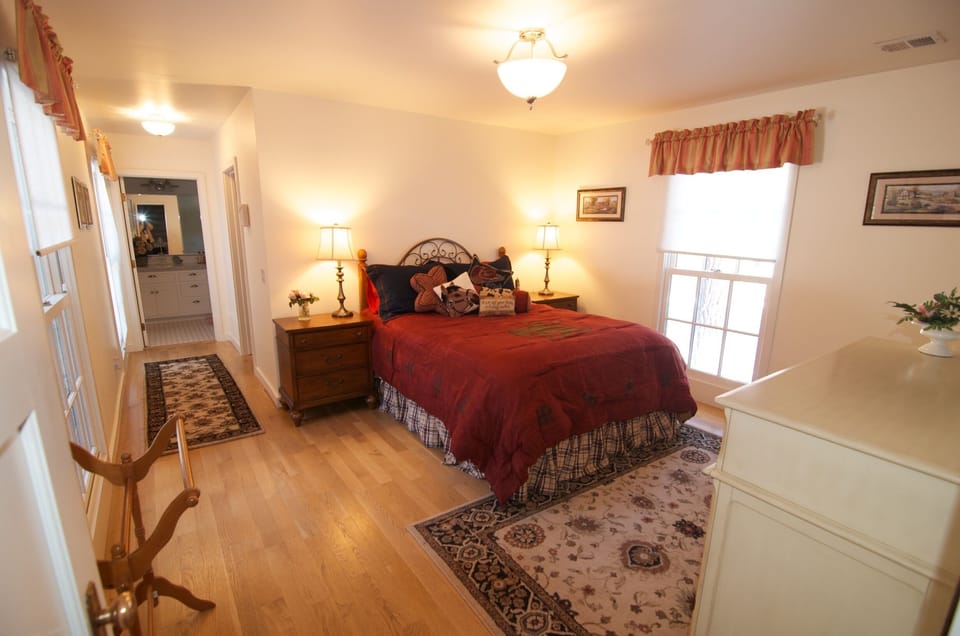 House #1Master bedroom with queen bed, flat screen   & full bath