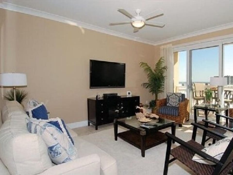 Living Room with sofa bed with 50in LCD TV