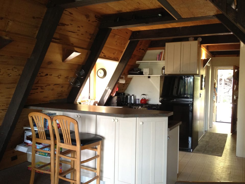 Full kitchen with oven, dishwasher, microwave, rice cooker, slow cooker and more