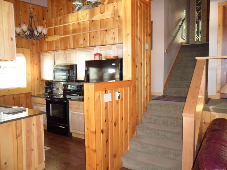 kitchen and stairs from entry 