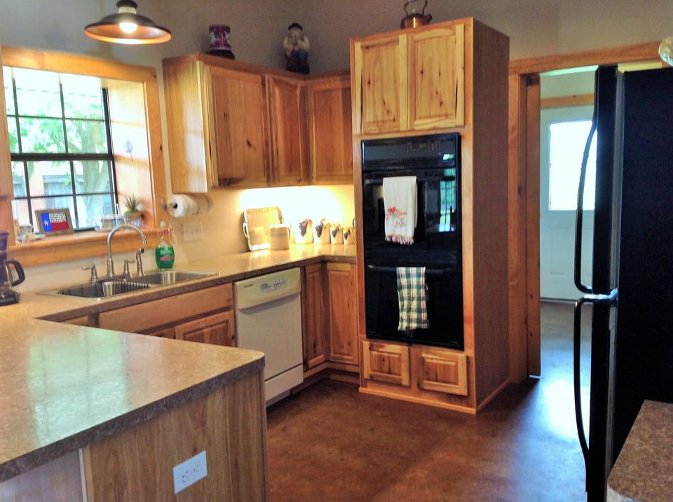 Kitchen with dishwasher, double oven