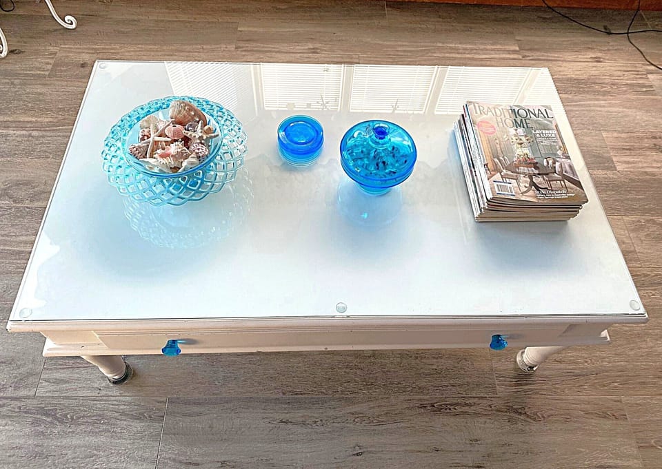 Living/Dining Rooms, Kitchen, Laundry, & Entry dressed in Porcelain Tile Floors 