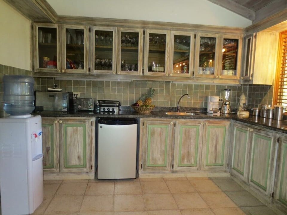 New beverage frig. water cooler and second prep sink. Complete glassware