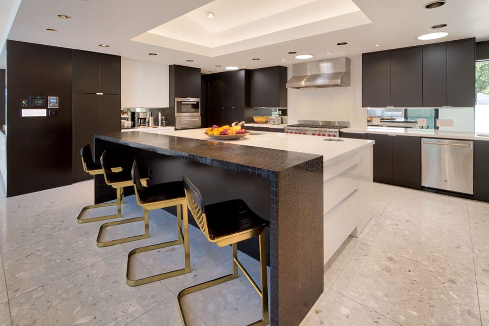 Chef's Kitchen. 8 Burner Wolf Gas Range, double ovens. 72" SubZero Fridge