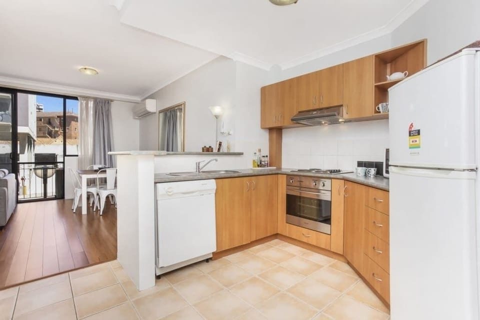 "Modern, fully-equipped kitchen perfect for home-cooked meals and relaxing stays."