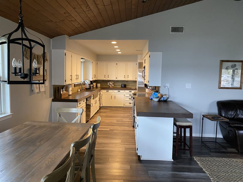 Fully stocked kitchen with SubZero refrigerator and beverage refrigerator