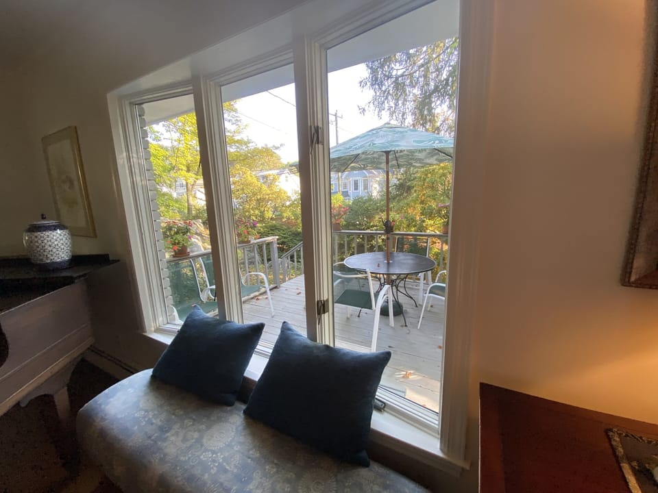Sitting area looking out on front deck.
