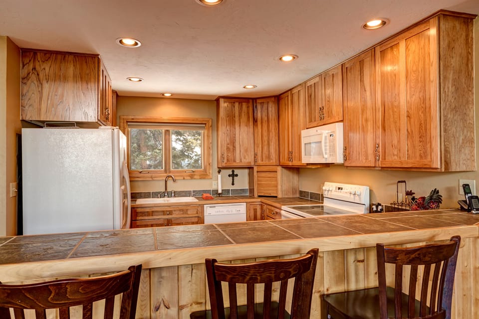 Fully stocked, spacious kitchen with everything you might need.