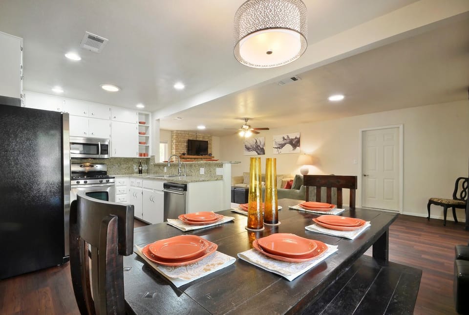 Dining Table can comfortably seat 6.  2 table extensions allow for seating up 12