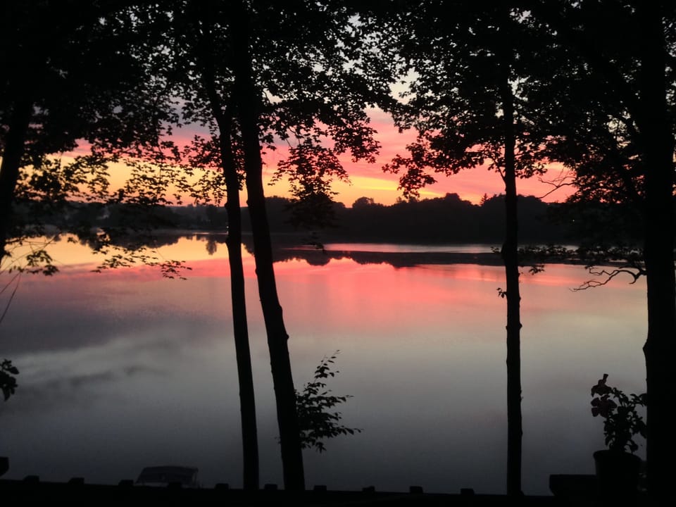Sunset over the lake, seen from the lodge's deck.