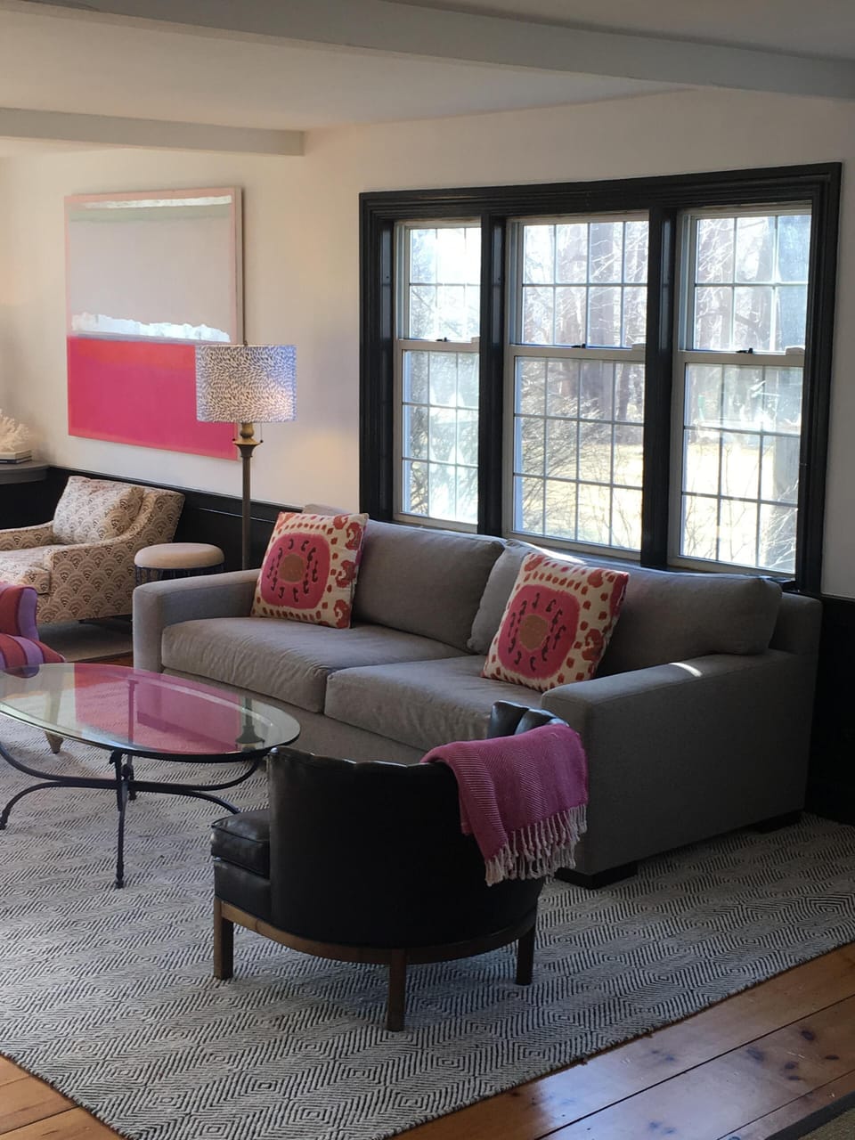 Living room with comfy sofa and large flat screen TV with premium channels