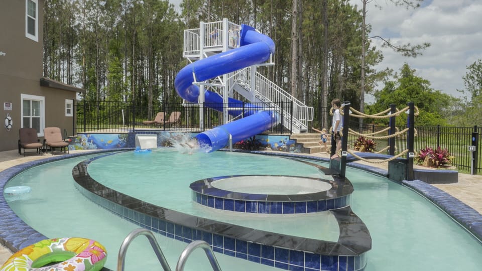 The "Go Fish" Pool, Lazy River, and Spa w/ "Shoot Your Ladder" slide..
