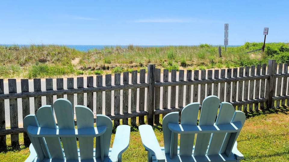 Enjoy wonderful Wellfleet Harbor water views from the front yard