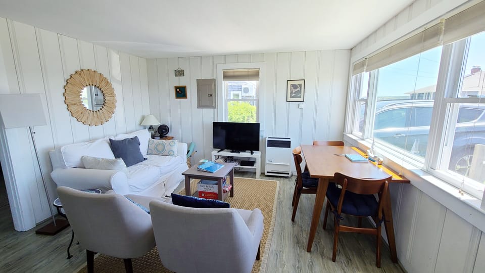Kitchen opens to living and dining area