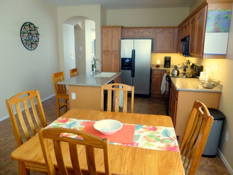 Kitchen table for 4 with flexibility of extra capacity up to 6 by adding leaf.
