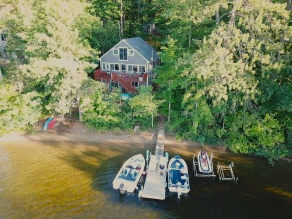 Aerial view.  Note: The boat slip to the left will be open for your use.