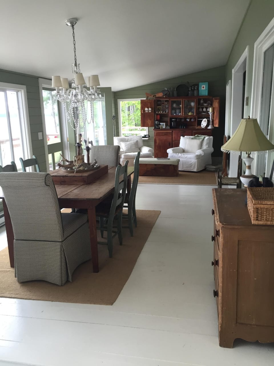 Upstairs front sunroom and large antique wood table for meals or gathering