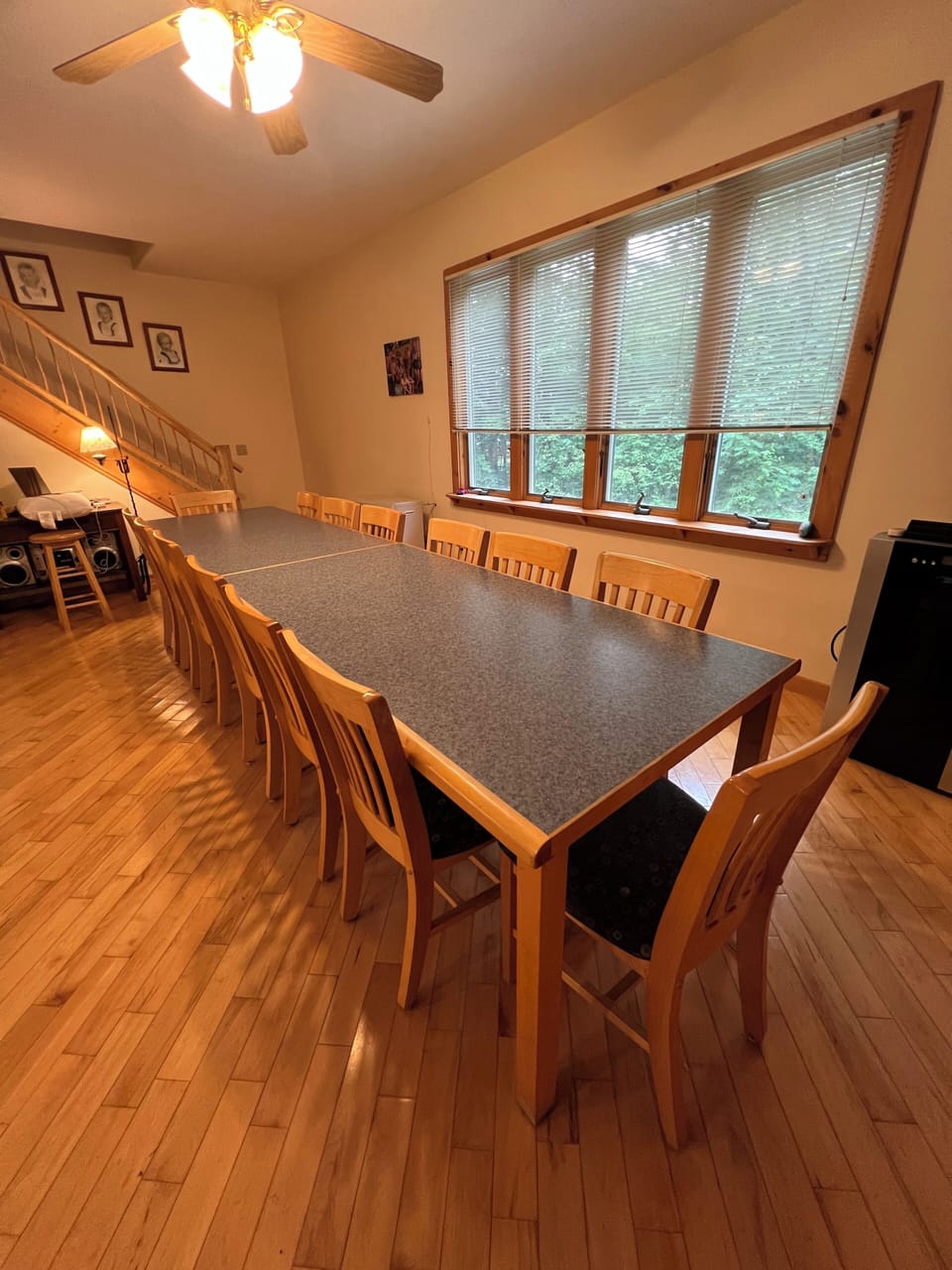 As our family expanded, so did the kitchen. Our new table (2019), seats 12-15.