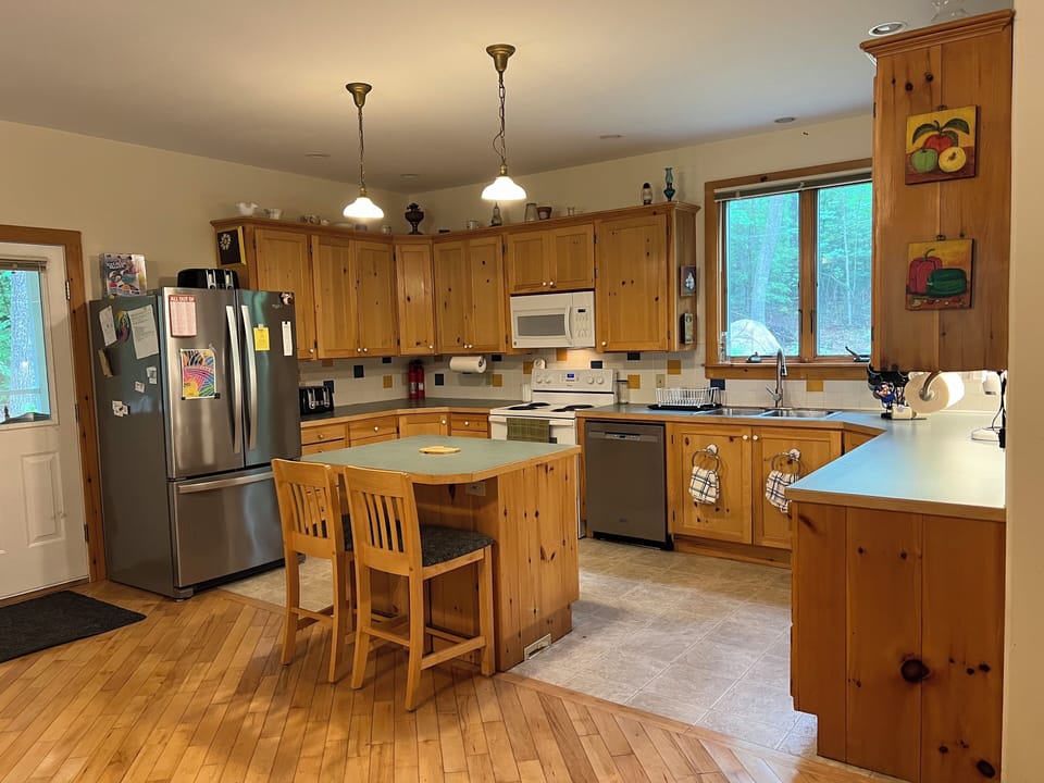 Kitchen includes fridge, stove, microwave, dishwasher and central vacuum system.
