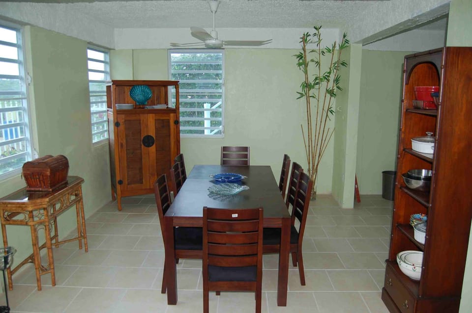 Lower level dining room seats 8 - 10 with water views.