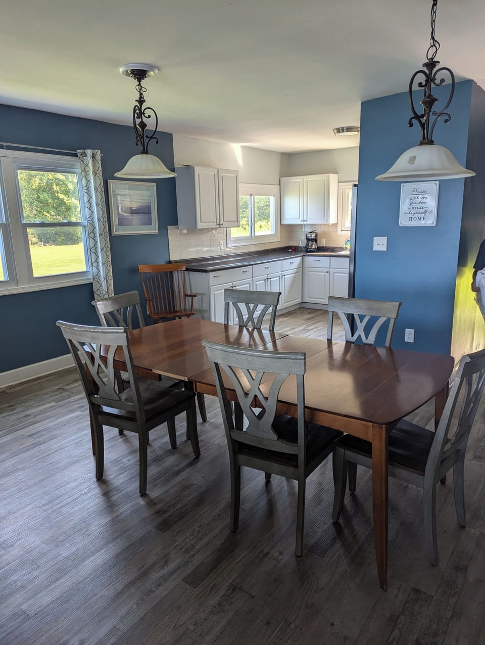 Dining area plus extra drop leaf table and chairs 