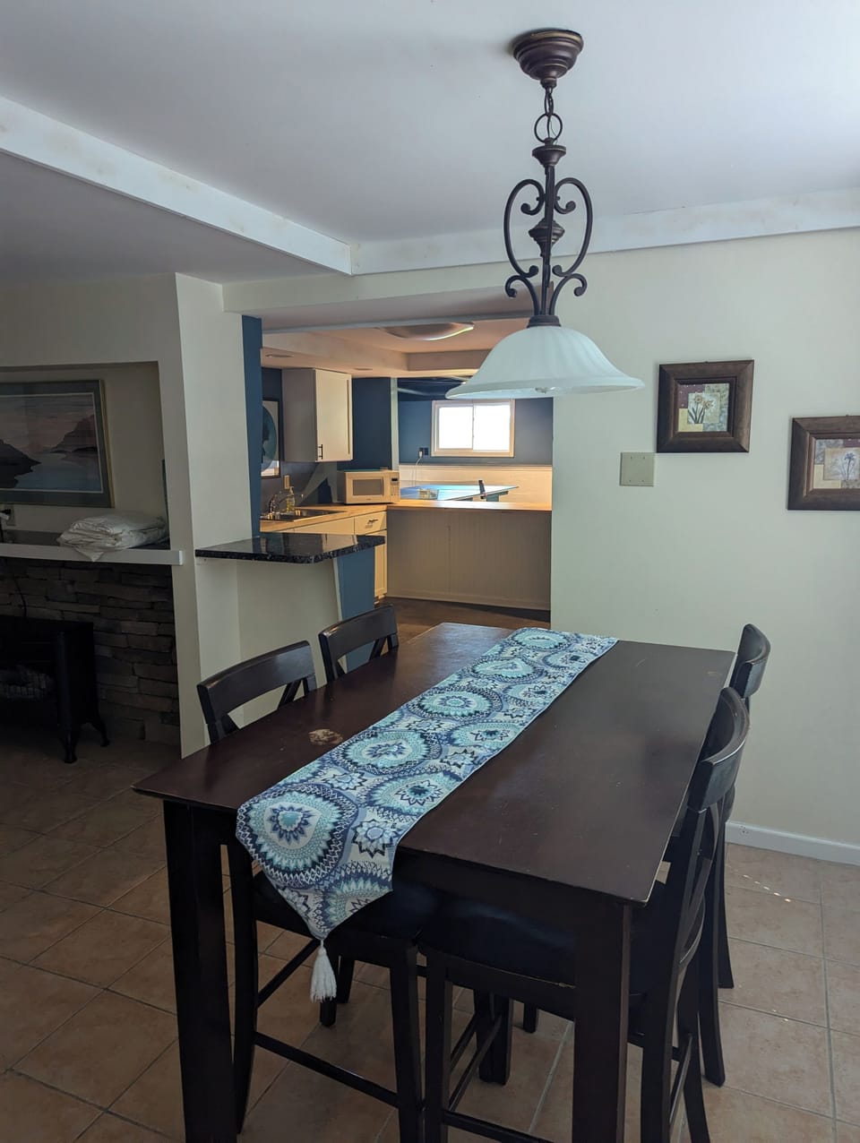 Second dining area in lower level, next to kitchenette and game room 