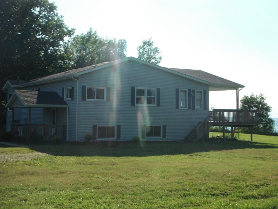 Side view of house- covered deck facing the Lake