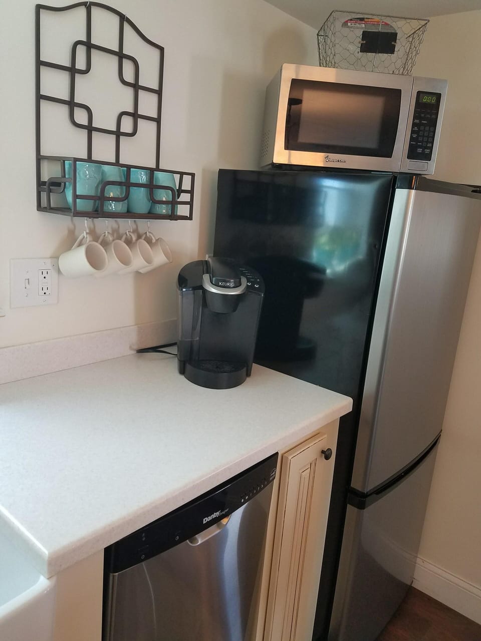 Keurig coffee maker, microwave, fridge 