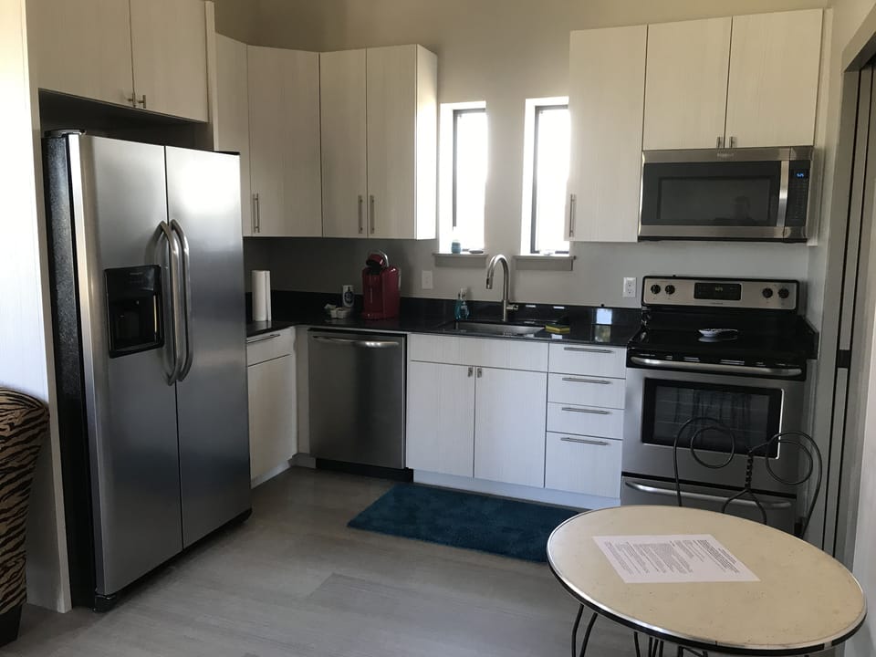 Nice kitchen with stainless-steel appliances, microwave, & Keurig coffee pot
